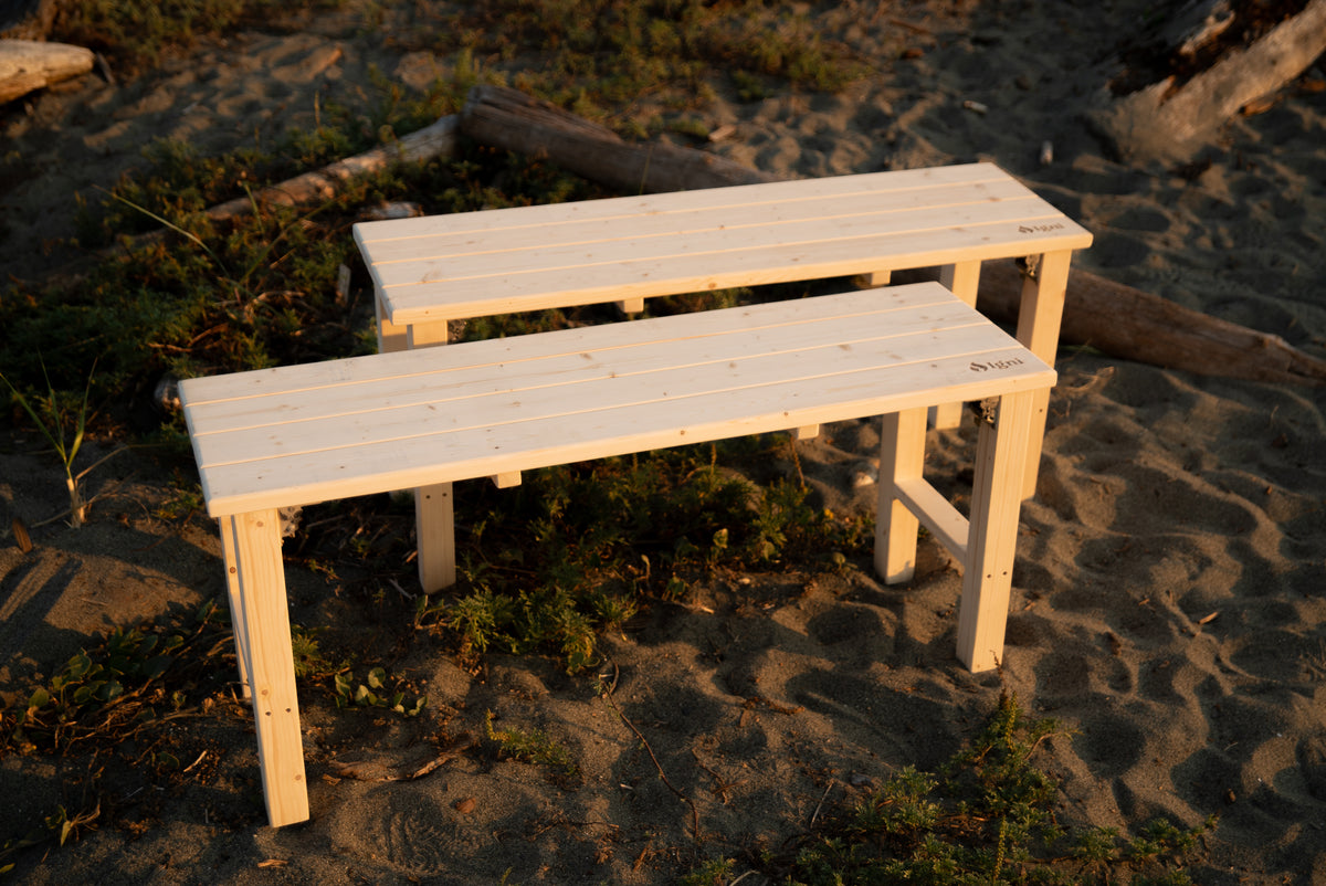 Igni sauna bench set up on a rocky shoreline