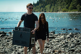 Carrying the Igni stove and rock basket along the beach